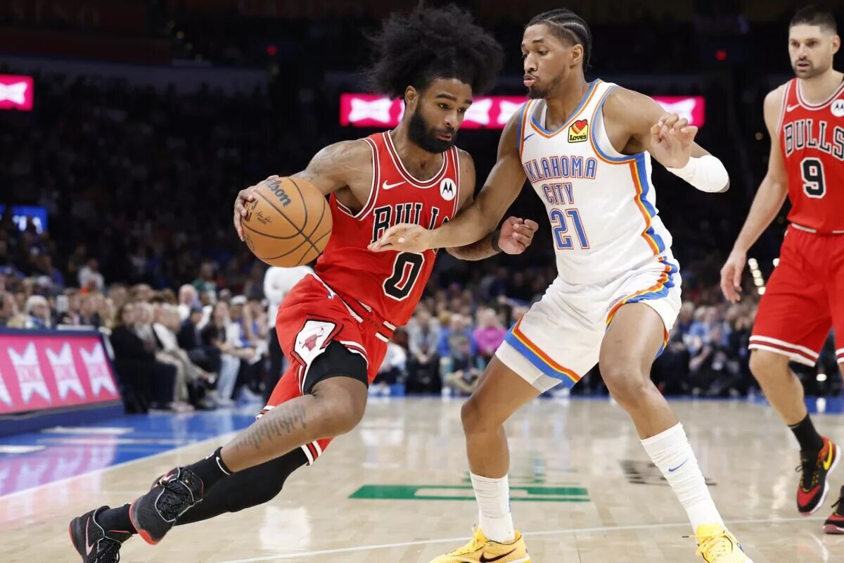 Chicago Bulls guard Coby White (0) drives against Oklahoma City Thunder guard Aaron Wiggins (21) during the second half at Paycom Center.