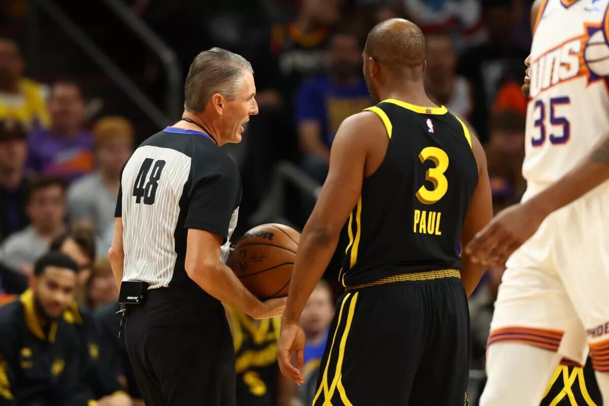 Nov 22, 2023; Phoenix, Arizona, USA; Golden State Warriors guard Chris Paul (3) argues with NBA referee Scott Foster after getting a technical foul against the Phoenix Suns in the first half at Footprint Center. Mandatory Credit: Mark J. Rebilas-USA TODAY Sports