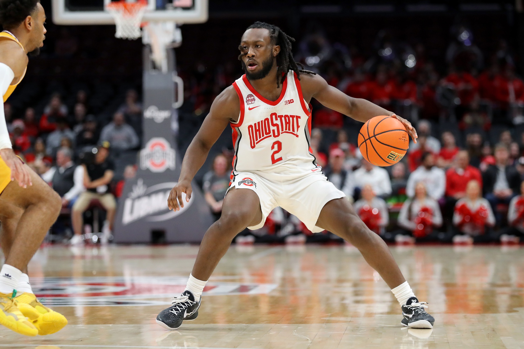 Ohio State Buckeyes guard Bruce Thornton (2) controls the ball as Central Michigan Chippewas guard Paul McMillan IV (34) defends on the play during the second half at Value City Arena.