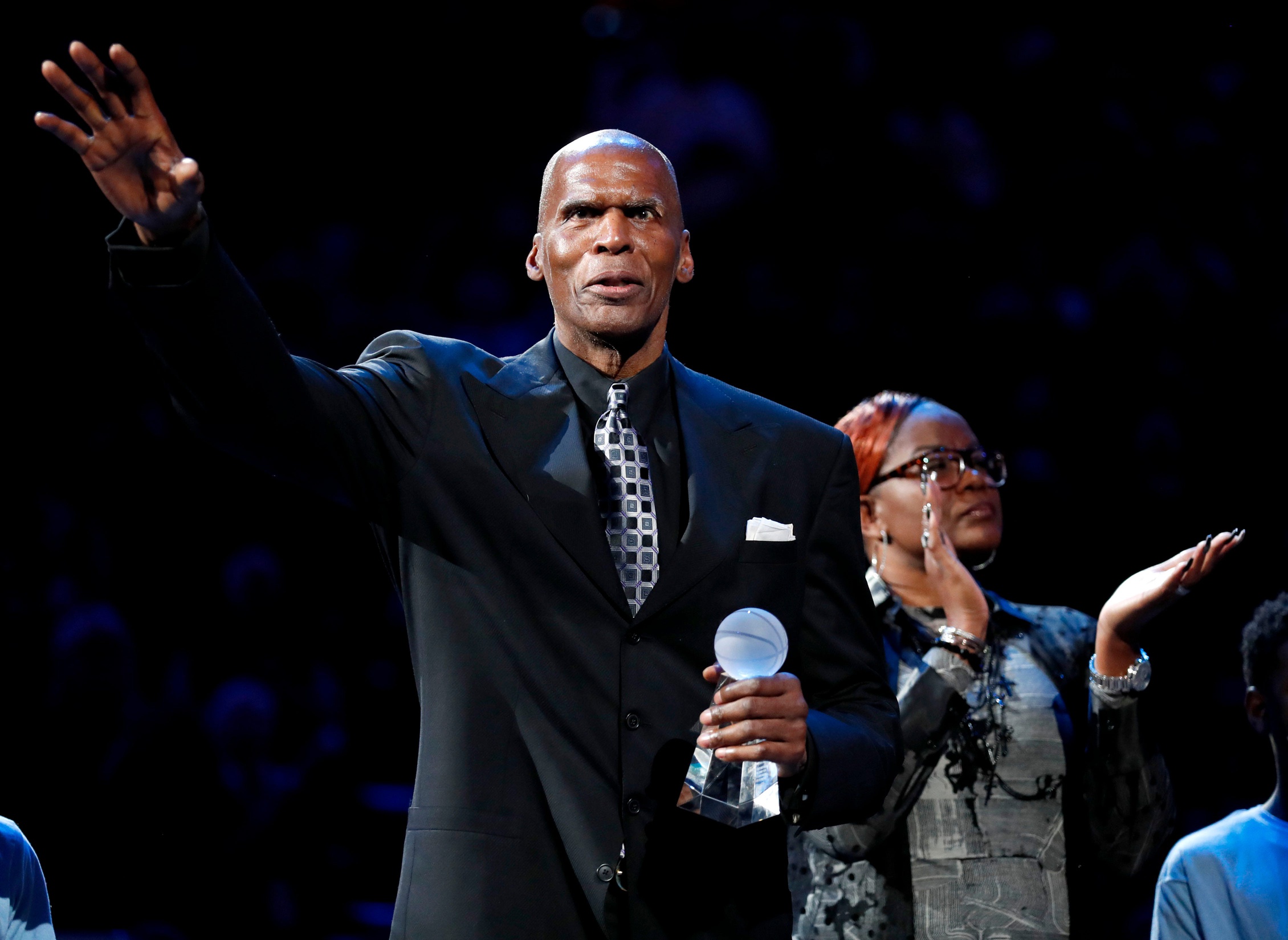 Robert Parish waves to the crowd after receiving the Sports Legacy Award on Monday, Jan. 20, 2020, before a game between the Grizzlies and Pelicans at the FedExForum in downtown Memphis.
