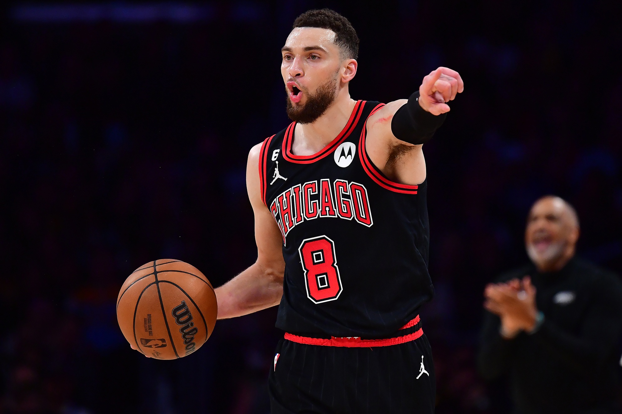 Mar 26, 2023; Los Angeles, California, USA; Chicago Bulls guard Zach LaVine (8) controls the ball against the Los Angeles Lakers during the second half at Crypto.com Arena. Mandatory Credit: Gary A. Vasquez-USA TODAY Sports