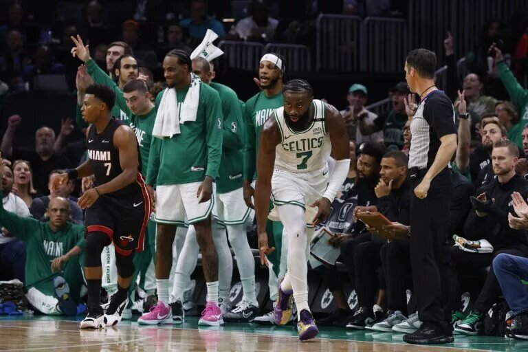 Oct 27, 2023; Boston, Massachusetts, USA; Boston Celtics guard Jaylen Brown (7) celebrates a three point basket against the Miami Heat during the second quarter at TD Garden. Mandatory Credit: Winslow Townson-USA TODAY Sports