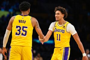 Nov 1, 2023; Los Angeles, California, USA; Los Angeles Lakers forward Christian Wood (35) celebrates with Los Angeles Lakers center Jaxson Hayes (11) against the LA Clippers during the third quarter at Crypto.com Arena. Mandatory Credit: Jonathan Hui-USA TODAY Sports