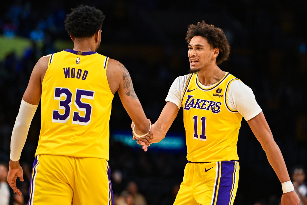 Nov 1, 2023; Los Angeles, California, USA; Los Angeles Lakers forward Christian Wood (35) celebrates with Los Angeles Lakers center Jaxson Hayes (11) against the LA Clippers during the third quarter at Crypto.com Arena. Mandatory Credit: Jonathan Hui-USA TODAY Sports
