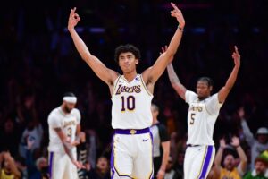 Dec 2, 2023; Los Angeles, California, USA; Los Angeles Lakers guard Max Christie (10) reacts after scoring three point basket against the Houston Rockets during the second half at Crypto.com Arena. Mandatory Credit: Gary A. Vasquez-USA TODAY Sports