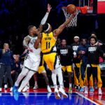 Dec 7, 2023; Las Vegas, Nevada, USA; Indiana Pacers forward Bruce Brown (11) shoots the ball against Milwaukee Bucks guard Damian Lillard (0) in the NBA In Season Tournament Semifinal at T-Mobile Arena. Mandatory Credit: Kyle Terada-USA TODAY Sports