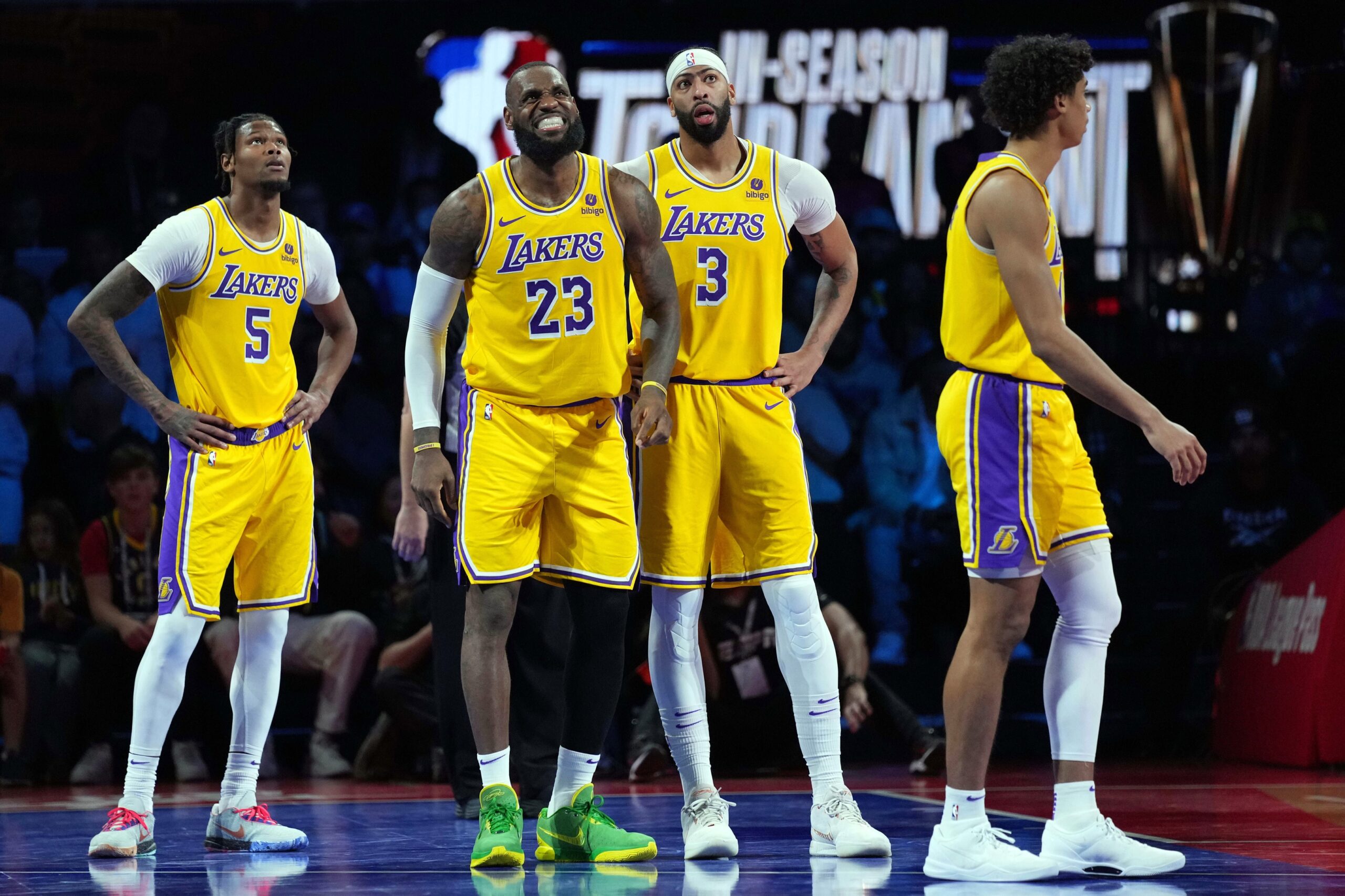 Los Angeles Lakers forward LeBron James (23) and forward Cam Reddish (5) and forward Anthony Davis (3) look on after a play against the Indiana Pacers in the fourth quarter of the in season tournament championship final at T-Mobile Arena.