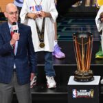 NBA commissioner Adam Silver presents the NBA Cup to the Los Angeles Lakers after winning the NBA In-Season Tournament Championship game against the Indiana Pacers at T-Mobile Arena.