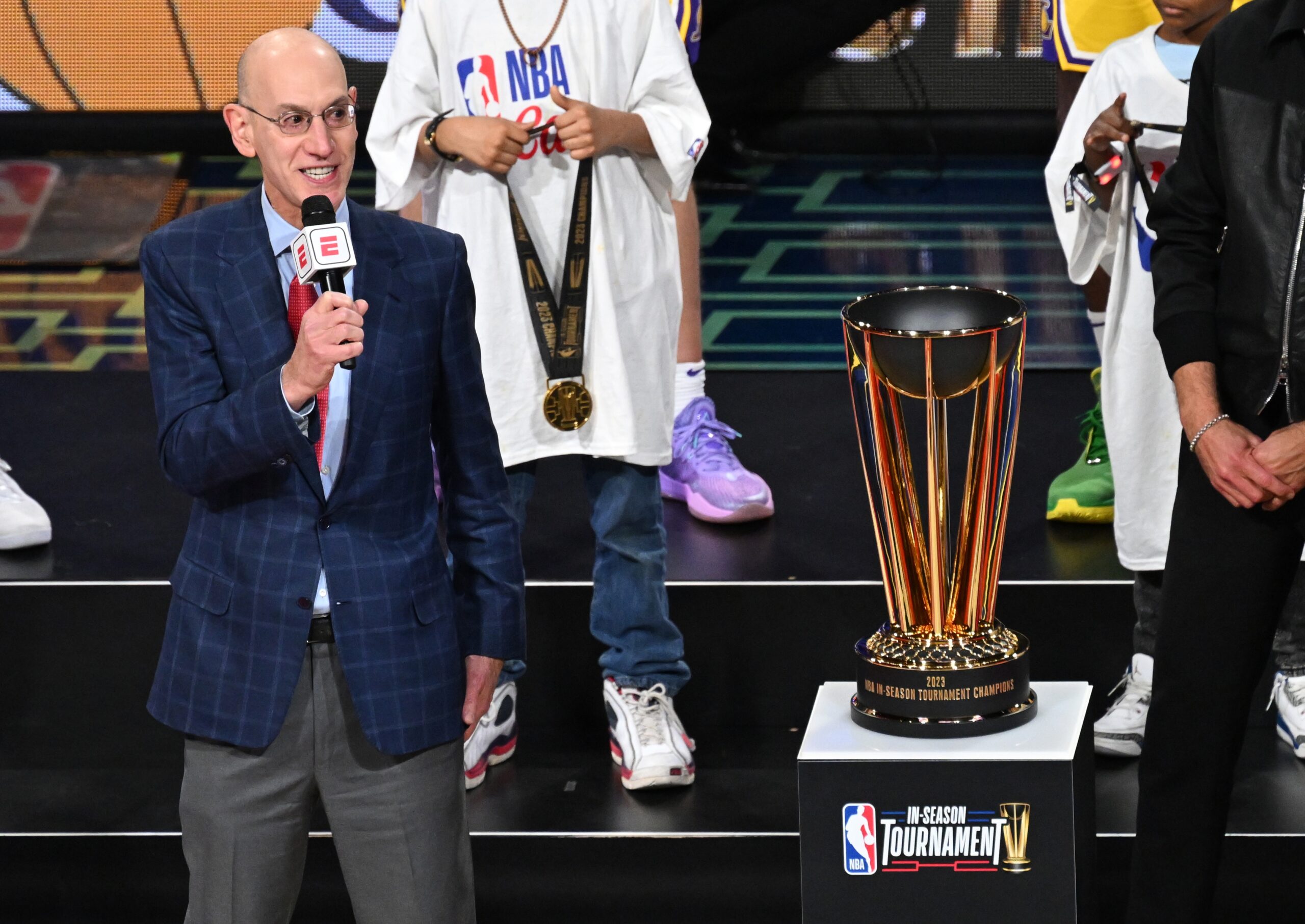 NBA commissioner Adam Silver presents the NBA Cup to the Los Angeles Lakers after winning the NBA In-Season Tournament Championship game against the Indiana Pacers at T-Mobile Arena.
