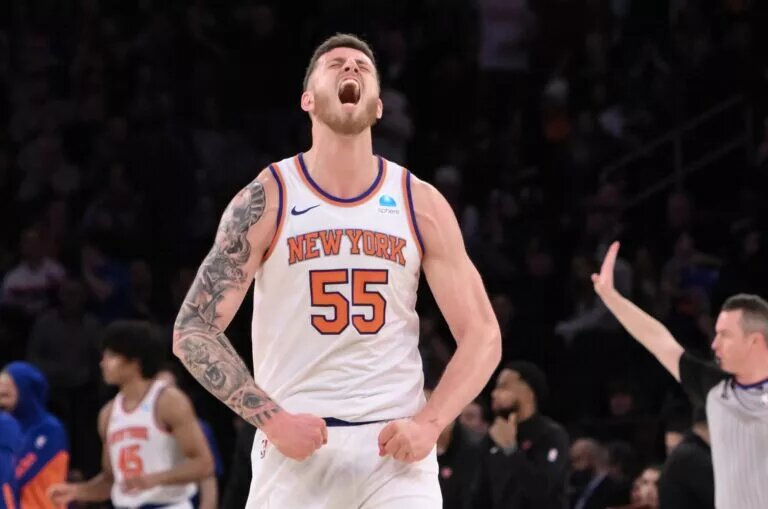 New York Knicks center Isaiah Hartenstein (55) reacts after a basket against the Toronto Raptors during the fourth quarter at Madison Square Garden.