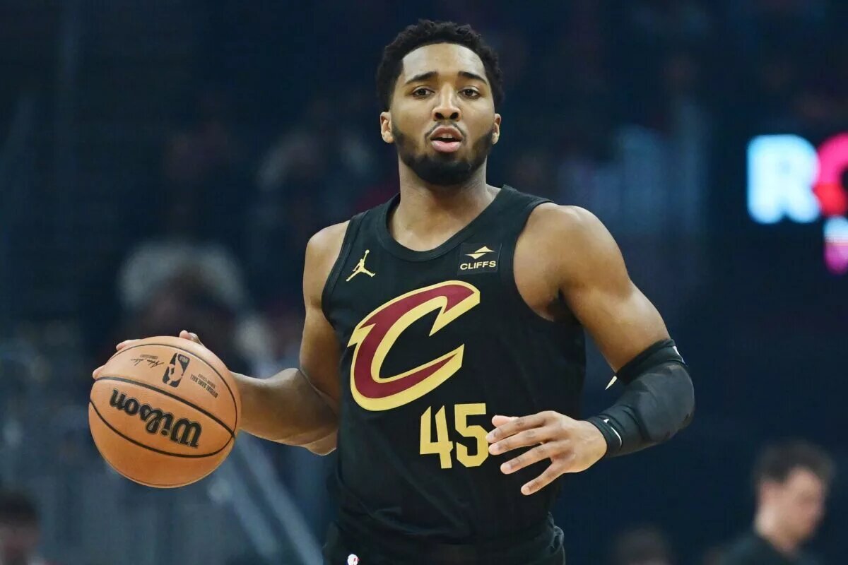 Cleveland Cavaliers guard Donovan Mitchell (45) brings the ball up court during the first half against the Milwaukee Bucks at Rocket Mortgage FieldHouse.
