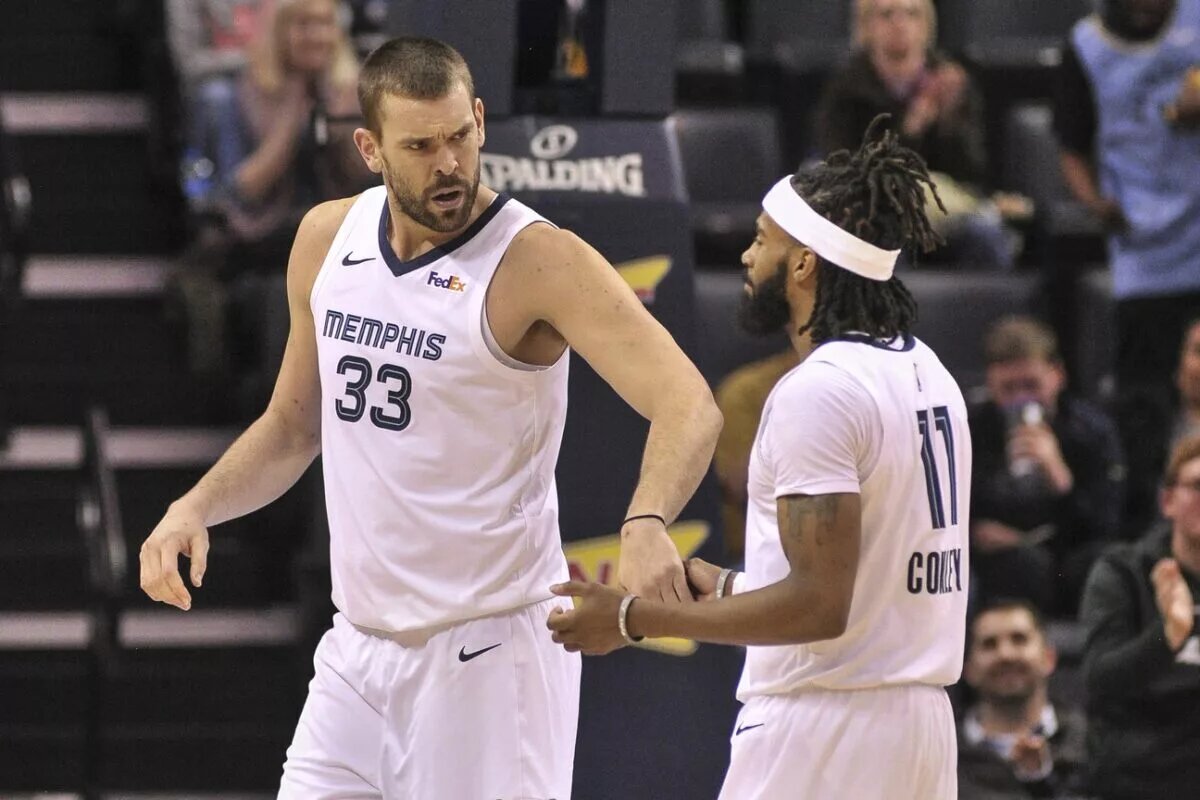 Jan 25, 2019; Memphis, TN, USA; Memphis Grizzlies center Marc Gasol (33) and guard Mike Conley (11) talk during the second half against the Sacramento Kings at FedExForum. Sacramento Kings defeated the Memphis Grizzlies 99-96.Mandatory Credit: Justin Ford-USA TODAY Sports