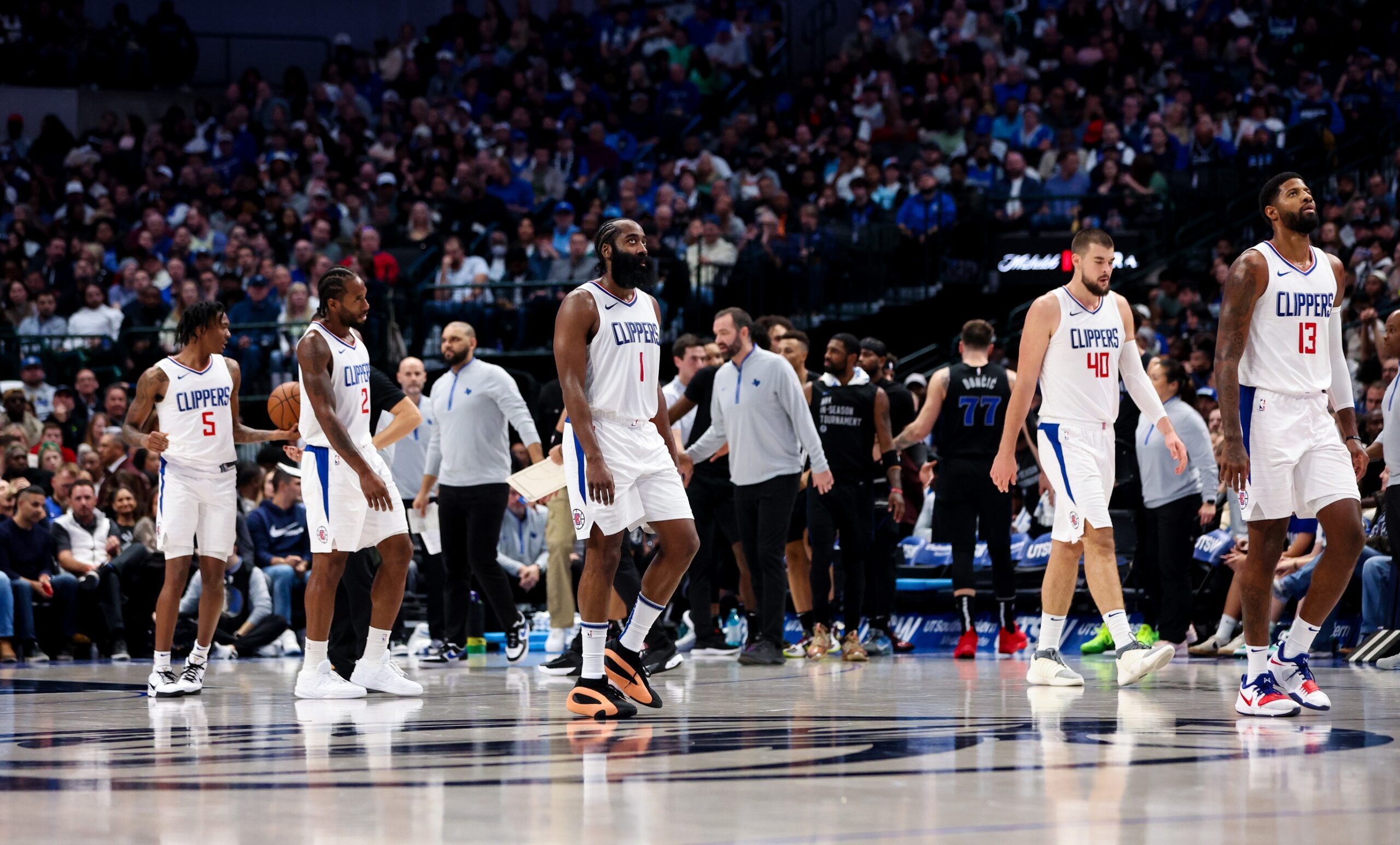 LA Clippers guard Bones Hyland (5) and LA Clippers forward Kawhi Leonard (2) and LA Clippers guard James Harden (1) and LA Clippers center Ivica Zubac (40) and LA Clippers forward Paul George (13) react during the second half against the Dallas Mavericks at American Airlines Center.