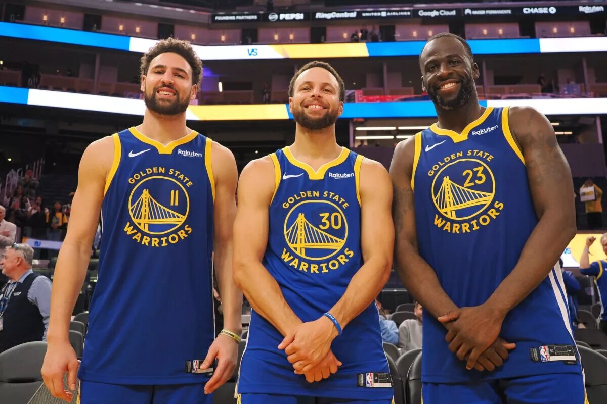 Nov 30, 2023; San Francisco, California, USA; Golden State Warriors guard Klay Thompson (11), guard Stephen Curry (30) and forward Draymond Green (23) after the game against the Los Angeles Clippers at Chase Center. Mandatory Credit: Kelley L Cox-USA TODAY Sports