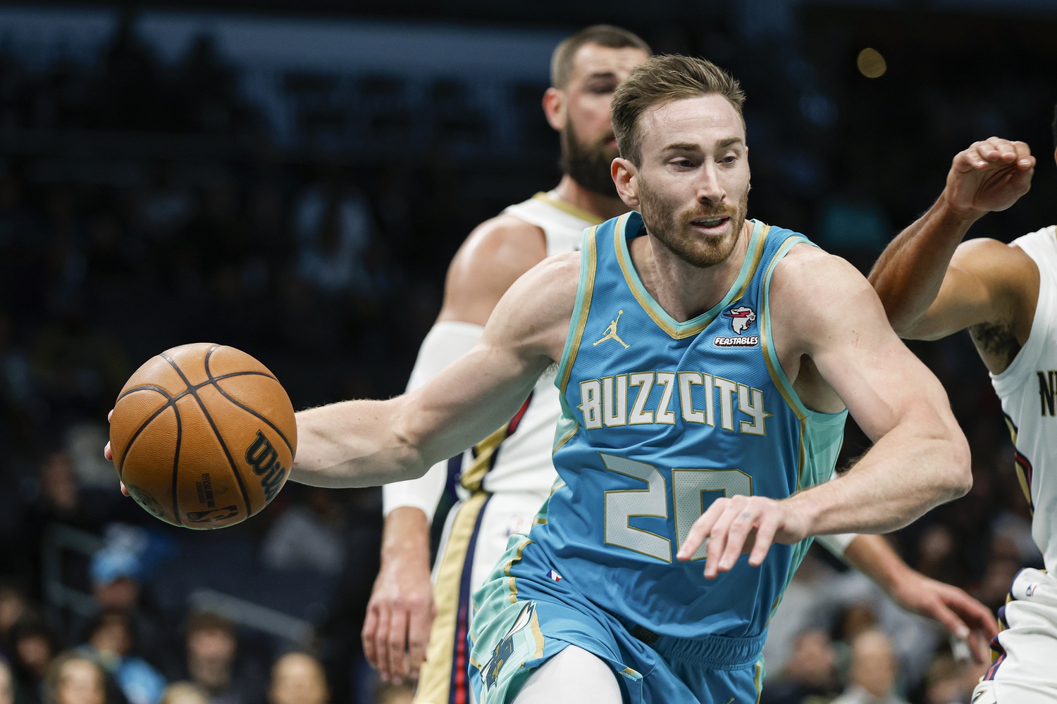 Charlotte Hornets forward Gordon Hayward (20) drives the baseline against the New Orleans Pelicans during the first quarter at Spectrum Center.