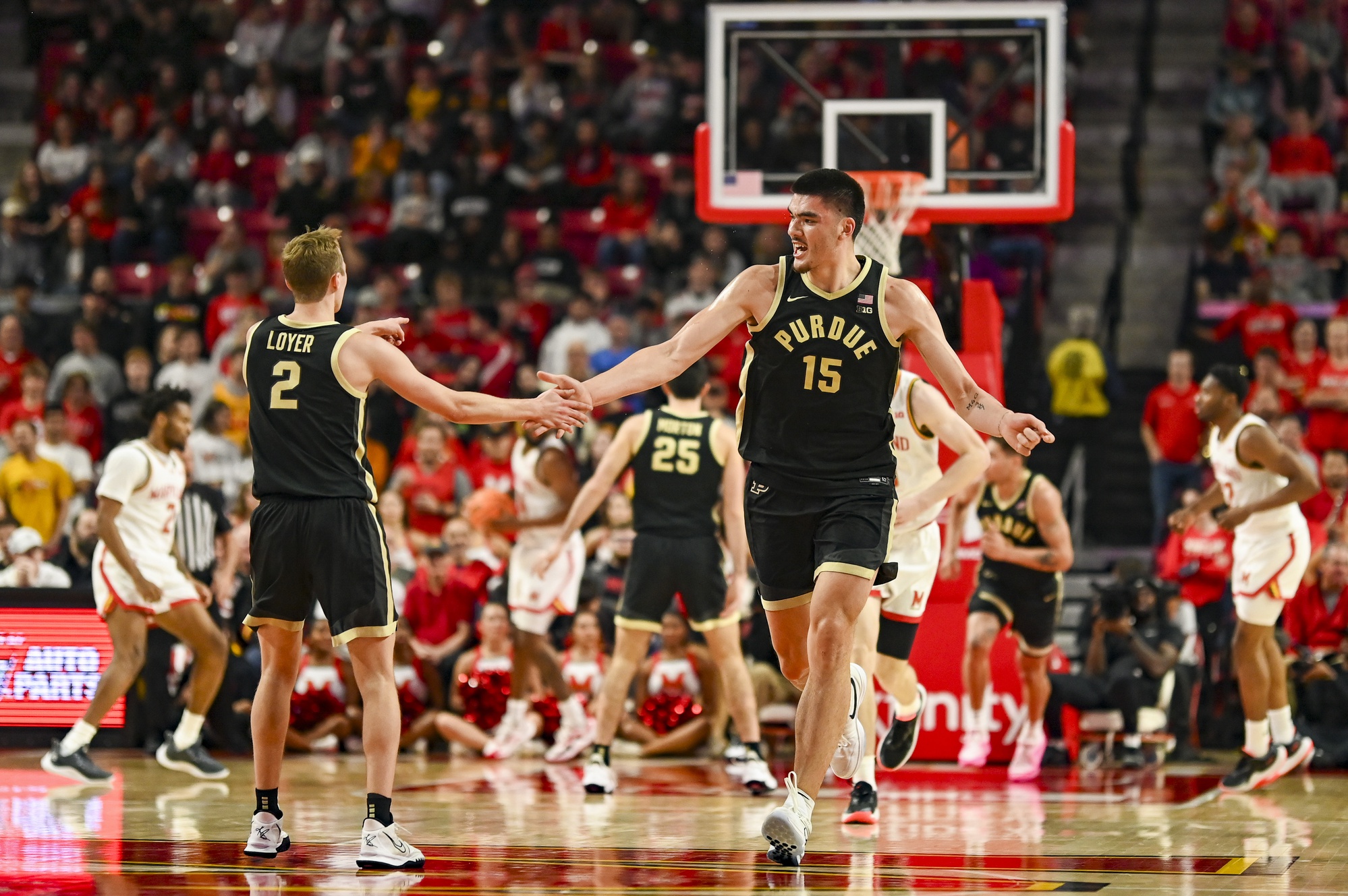 Jan 2, 2024; College Park, Maryland, USA; Purdue Boilermakers center Zach Edey (15) celebrates with guard Fletcher Loyer (2) after making a basket during the second half against the Maryland Terrapins at Xfinity Center. Mandatory Credit: Tommy Gilligan-USA TODAY Sports