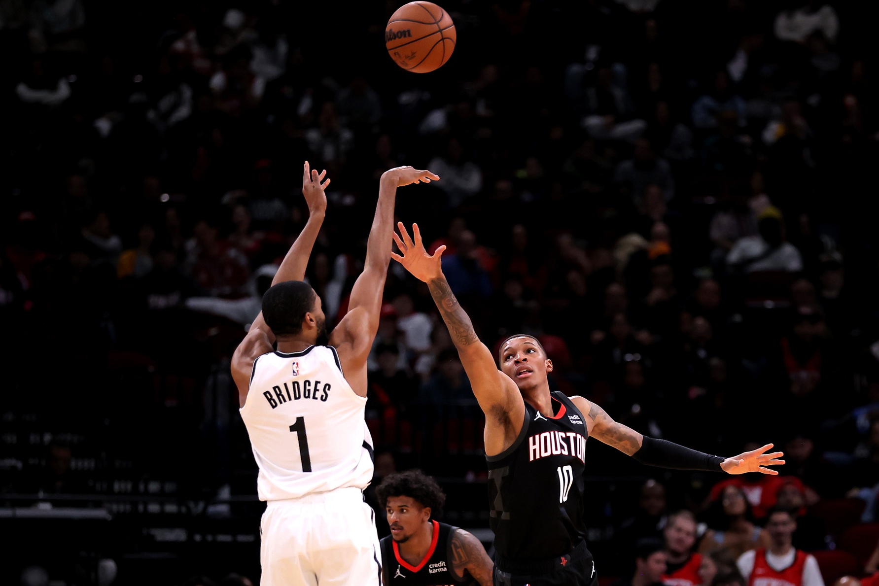 Brooklyn Nets forward Mikal Bridges (1) shoots against Houston Rockets forward Jabari Smith Jr. (10) during the fourth quarter at Toyota Center.