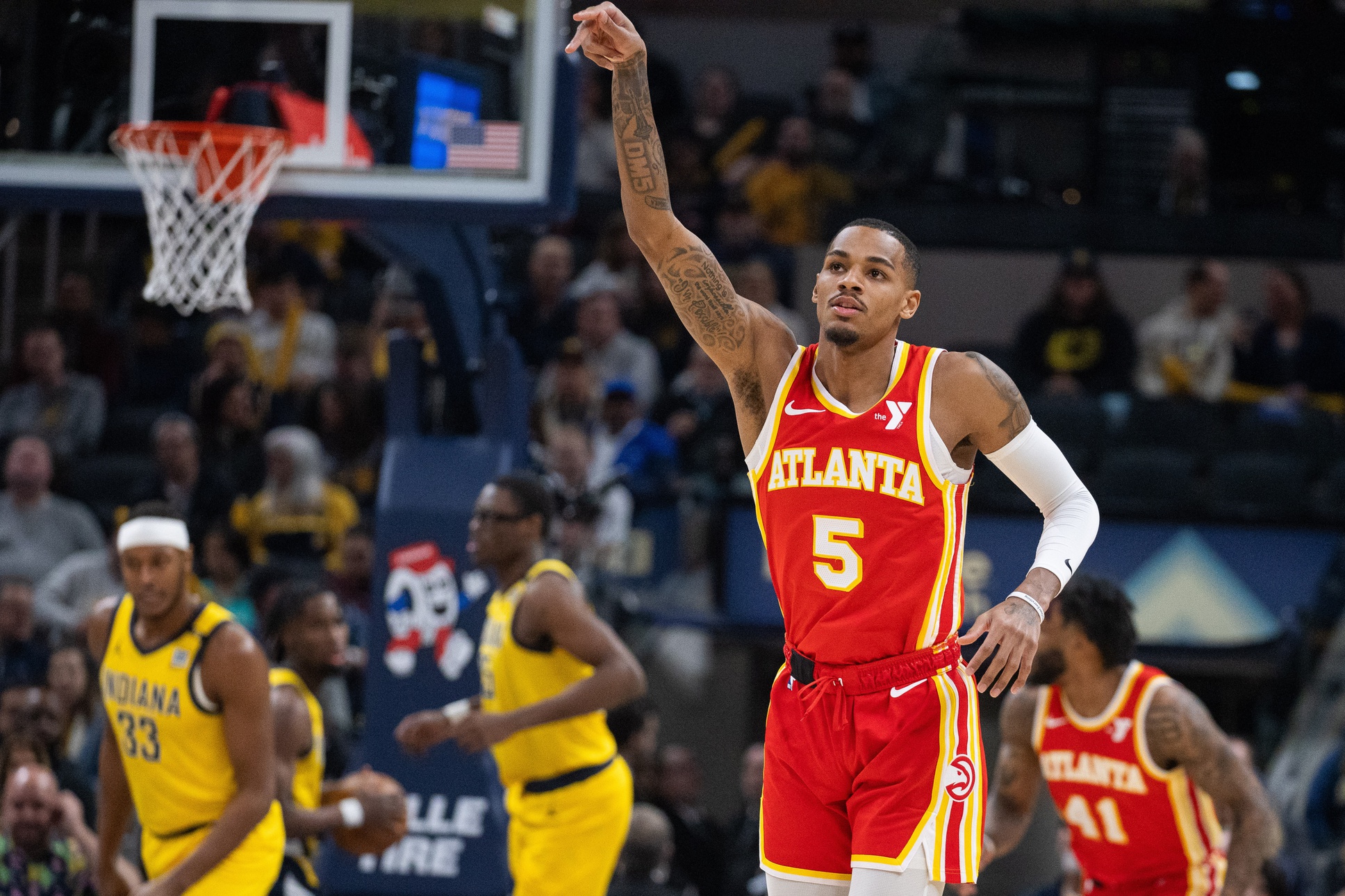 Atlanta Hawks guard Dejounte Murray (5) celebrates a basket in the first quarter against the Indiana Pacers at Gainbridge Fieldhouse.