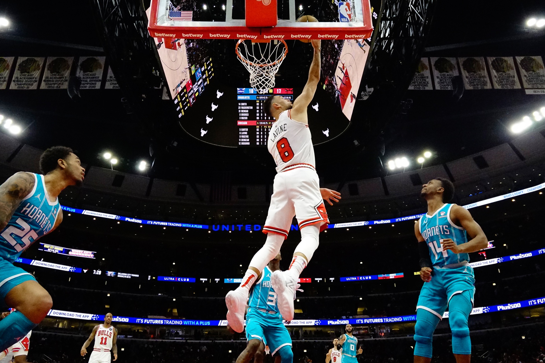 Chicago Bulls guard Zach LaVine (8) shoots a layup against the Charlotte Hornets during the first half at United Center.