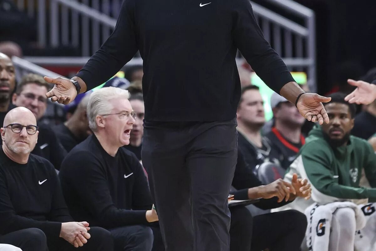 Milwaukee Bucks head coach Adrian Griffin reacts during the third quarter against the Houston Rockets at Toyota Center.