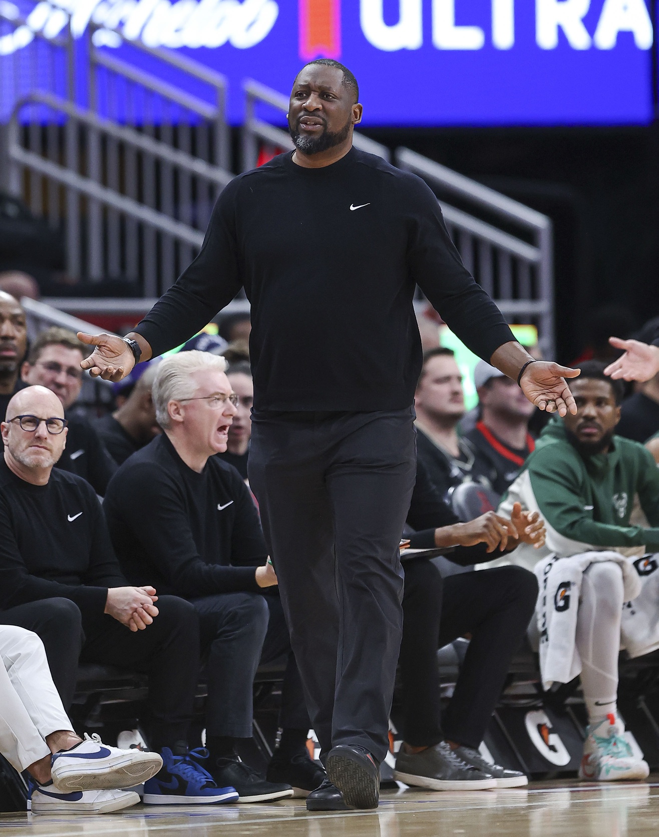 Milwaukee Bucks head coach Adrian Griffin reacts during the third quarter against the Houston Rockets at Toyota Center.