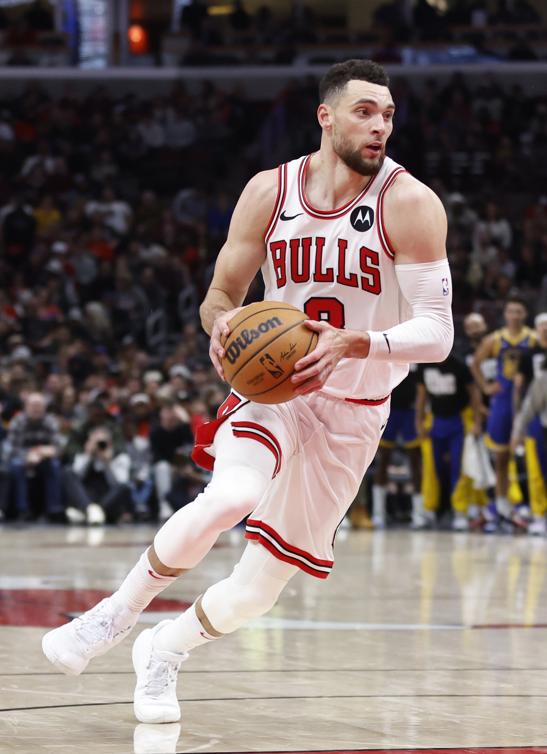 Chicago Bulls guard Zach LaVine (8) drives during the second half against the Golden State Warriors at United Center.