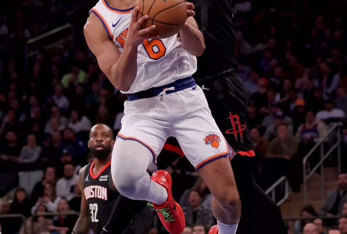 New York Knicks guard Quentin Grimes (6) is fouled by Houston Rockets forward Cam Whitmore (7) as he drives to the basket during the second quarter at Madison Square Garden.