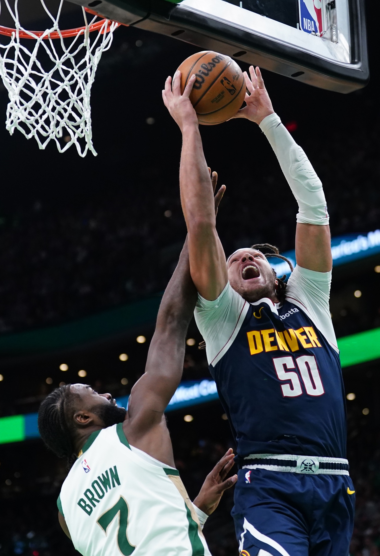 Denver Nuggets forward Aaron Gordon (50) shoots against Boston Celtics guard Jaylen Brown (7) in the first quarter at TD Garden.