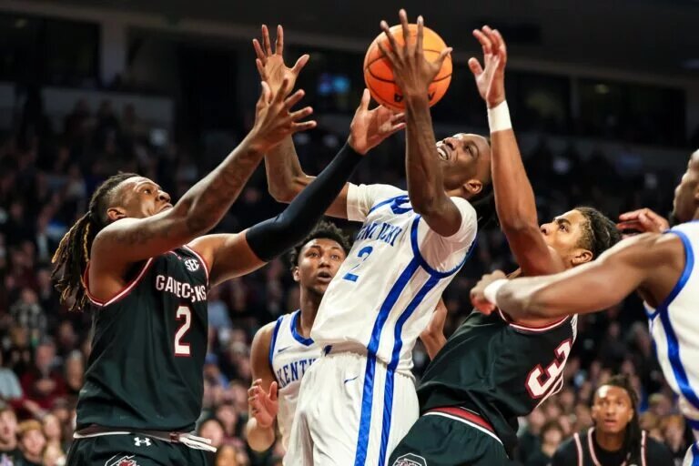 South Carolina Gamecocks forward B.J. Mack (2) and forward Benjamin Bosmans-Verdonk (31) battle Kentucky Wildcats forward Aaron Bradshaw (2) for a rebound in the first half at Colonial Life Arena.