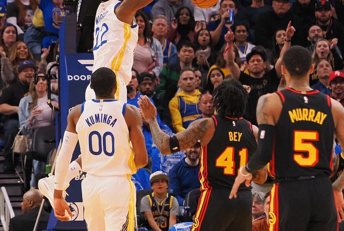 Golden State Warriors forward Andrew Wiggins (22) dunks the ball against the Atlanta Hawks during the second quarter at Chase Center.