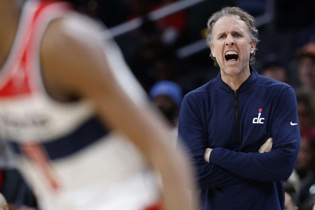 Washington Wizards interim head coach Brian Keefe yells from the bench against the Utah Jazz in the second half at Capital One Arena.