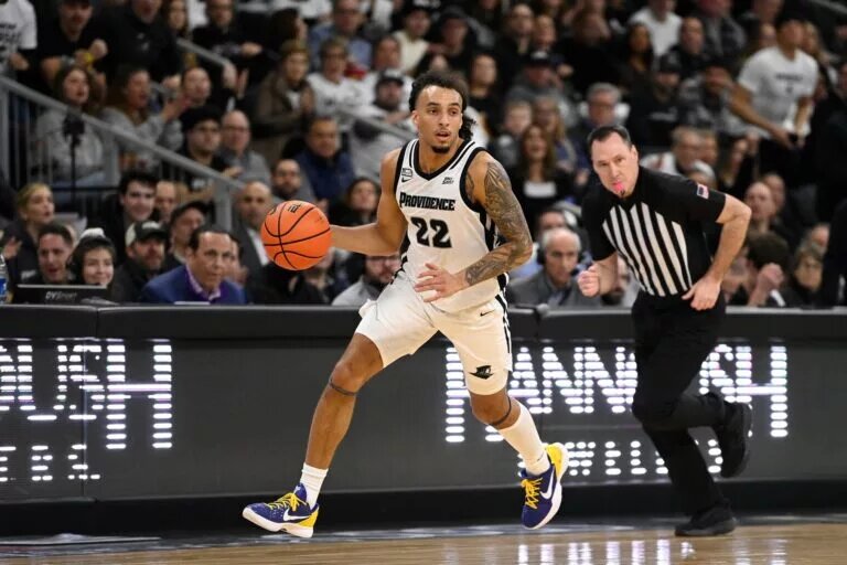Providence Friars guard Devin Carter (22) dribbles the ball against the Georgetown Hoyas during the first half at Amica Mutual Pavilion.