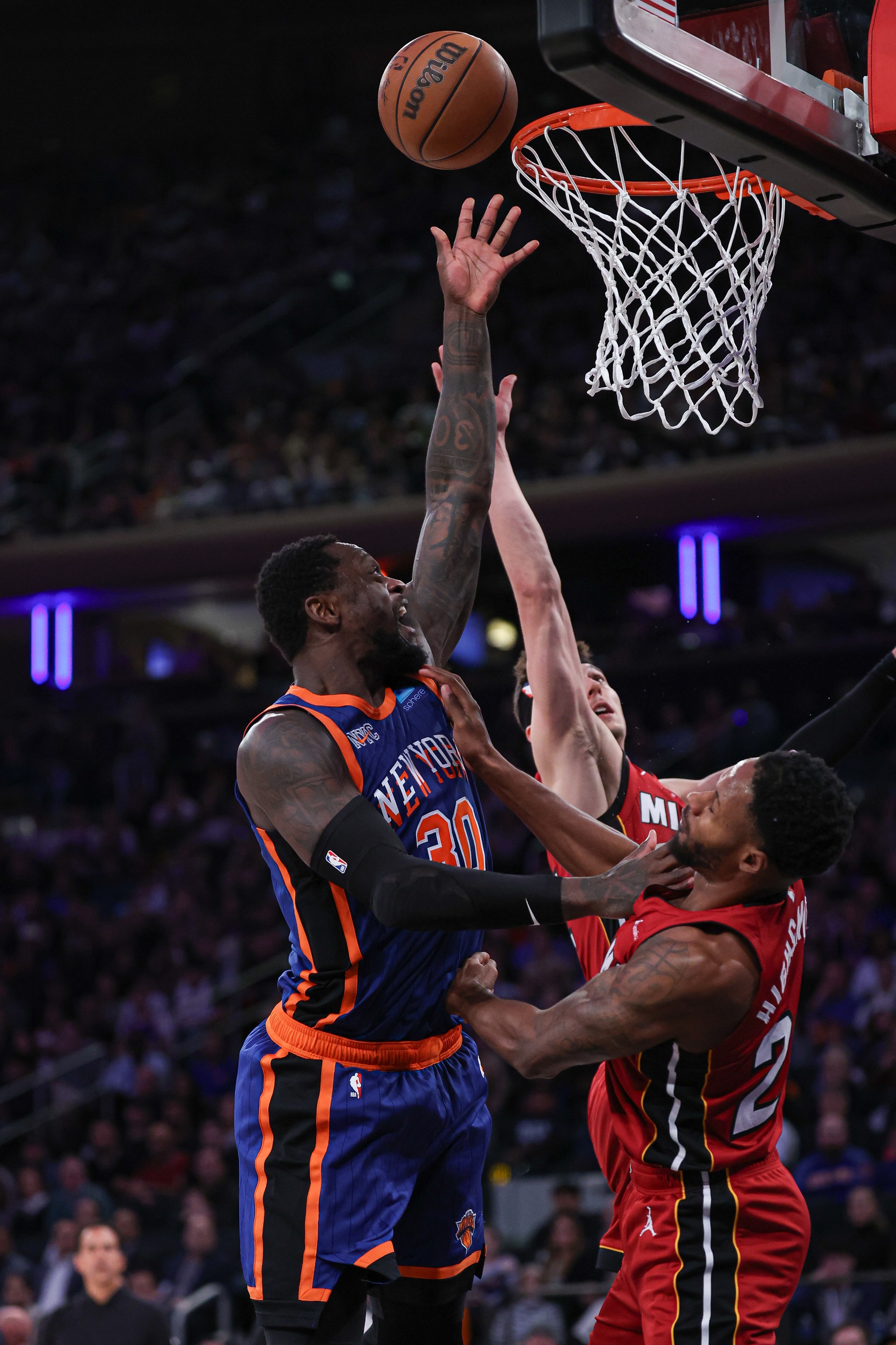 New York Knicks forward Julius Randle (30) shoots the ball as Miami Heat forward Haywood Highsmith (24) defends during the second half at Madison Square Garden.