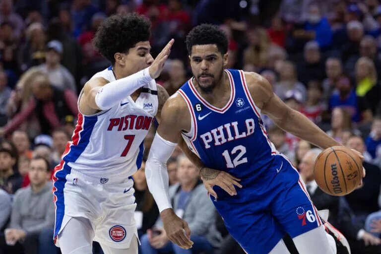 Jan 10, 2023; Philadelphia, Pennsylvania, USA; Philadelphia 76ers forward Tobias Harris (12) drives against Detroit Pistons guard Killian Hayes (7) during the second quarter at Wells Fargo Center. Mandatory Credit: Bill Streicher-USA TODAY Sports