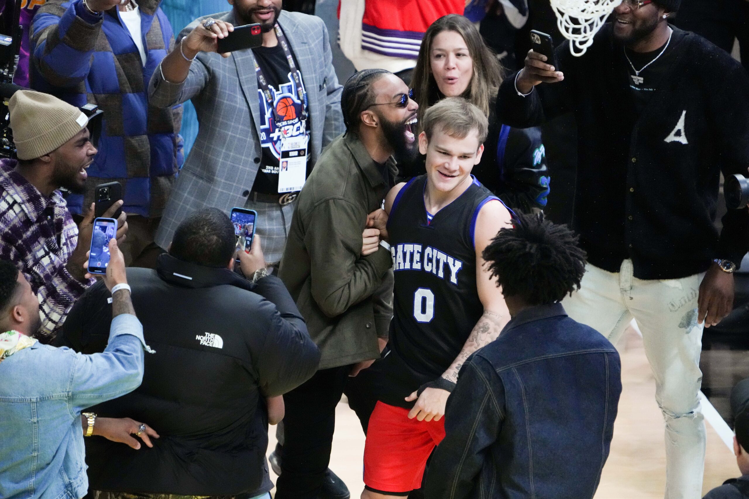 Feb 18, 2023; Salt Lake City, UT, USA; Philadelphia 76ers guard Mac McClung (9) reacts in the Dunk Contest during the 2023 All Star Saturday Night at Vivint Arena. Mandatory Credit: Kirby Lee-USA TODAY Sports