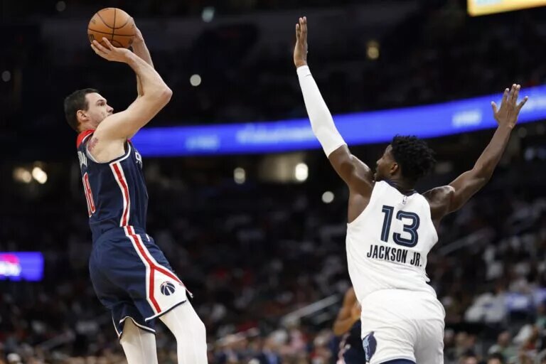 Washington Wizards forward Danilo Gallinari (88) shoots the ball over Memphis Grizzlies forward Jaren Jackson Jr. (13) in the second quarter at Capital One Arena.