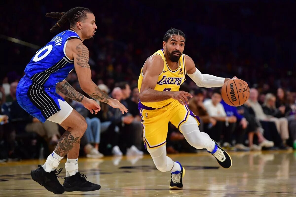 Los Angeles Lakers guard Gabe Vincent (7) moves to the basket against Orlando Magic guard Cole Anthony (50) during the second half at Crypto.com Arena.