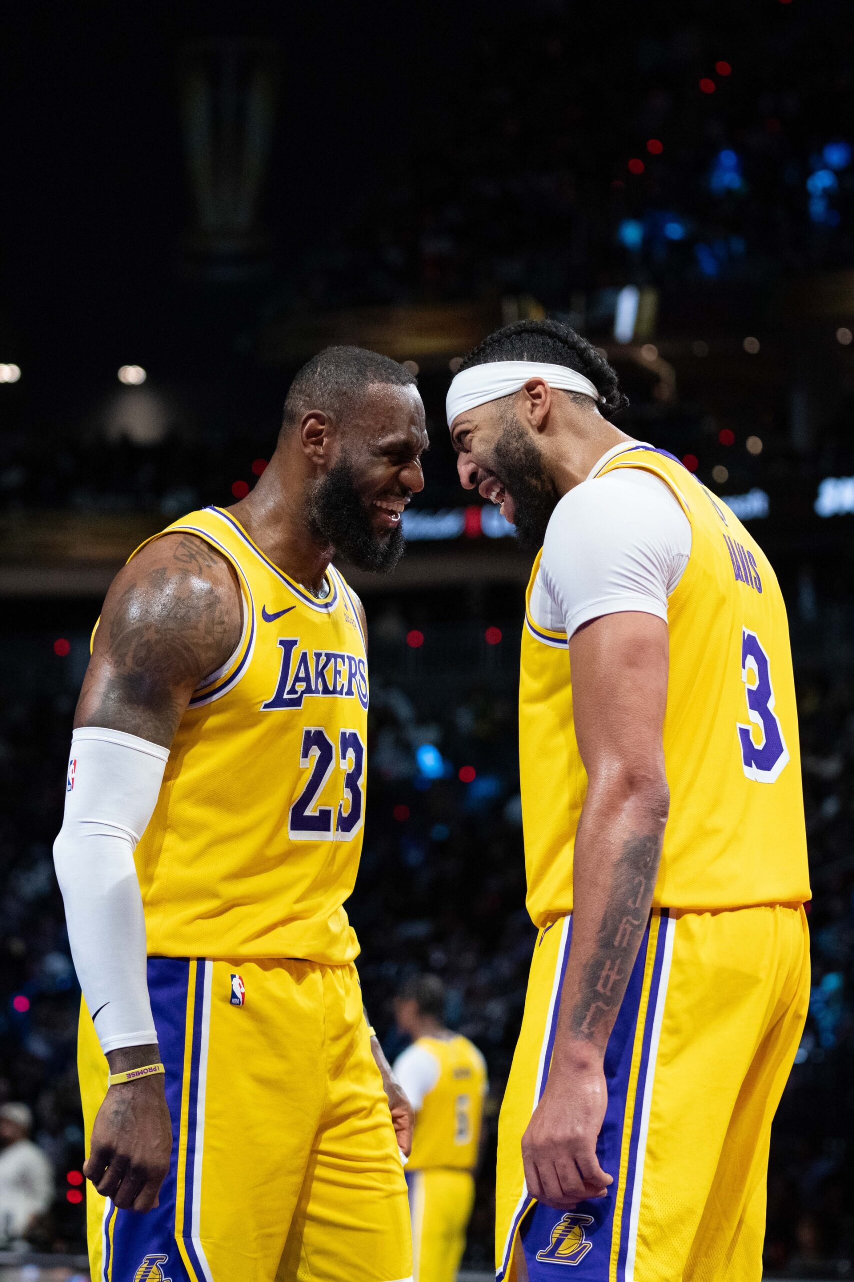 Los Angeles Lakers forward LeBron James (23) and forward Anthony Davis (3) celebrate after winning the in season tournament championship final against the Indiana Pacers at T-Mobile Arena.