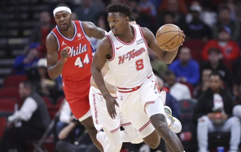 Dec 29, 2023; Houston, Texas, USA; Houston Rockets forward Jae'Sean Tate (8) drives with the ball on a fast break during the first quarter against the Philadelphia 76ers at Toyota Center. Mandatory Credit: Troy Taormina-USA TODAY Sports