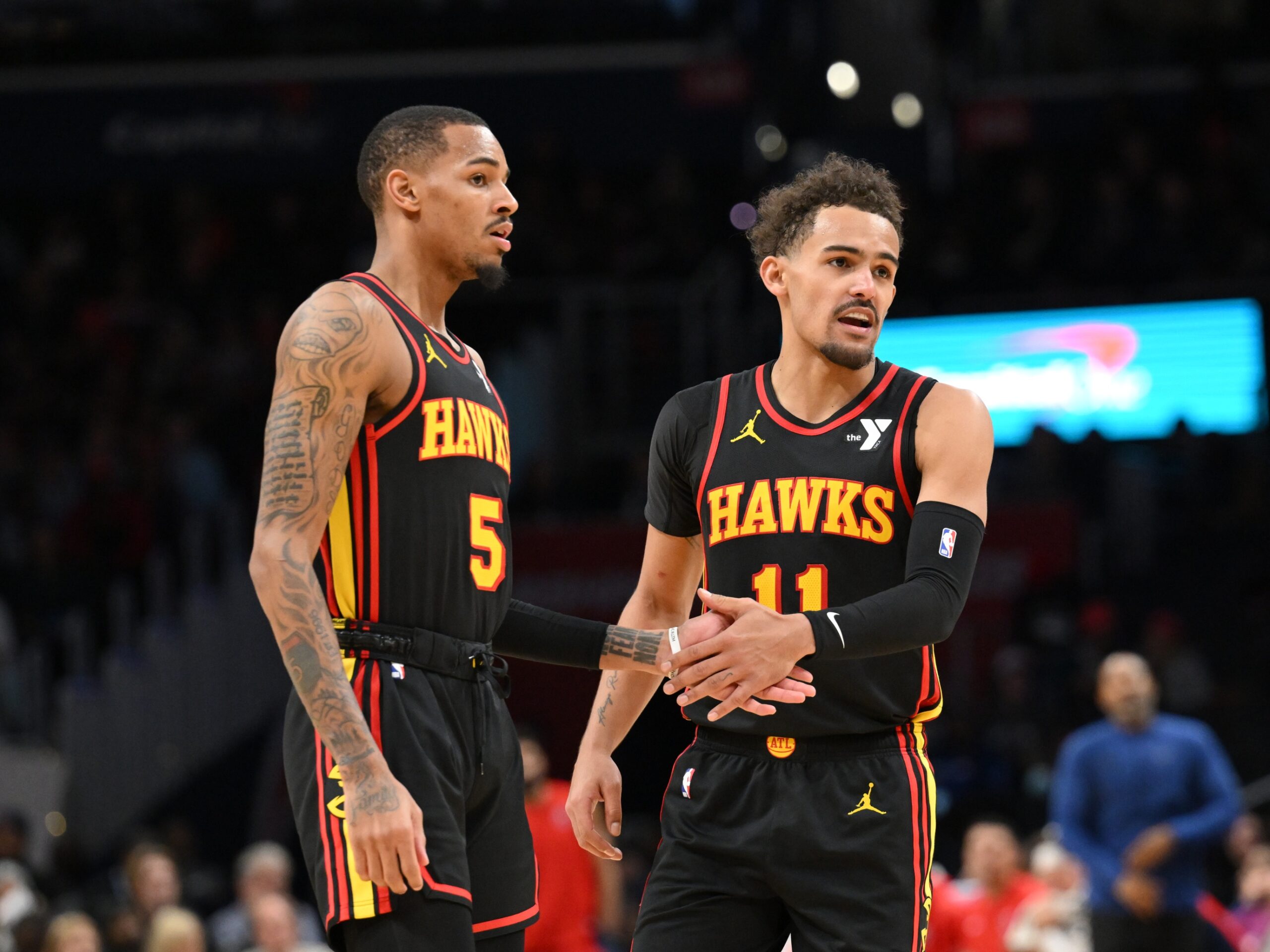 Atlanta Hawks guard Dejounte Murray (5) and guard Trae Young (11) celebrate during the second half against the Washington Wizards at Capital One Arena.