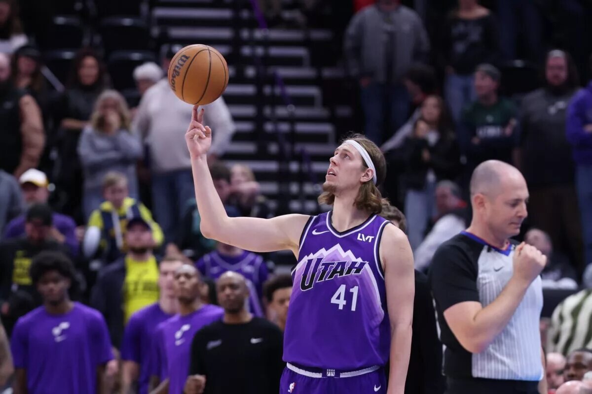 Jan 3, 2024; Salt Lake City, Utah, USA; Utah Jazz forward Kelly Olynyk (41) spins the ball on his finger during a timeout against the Detroit Pistons in overtime at Delta Center. Mandatory Credit: Rob Gray-USA TODAY Sports