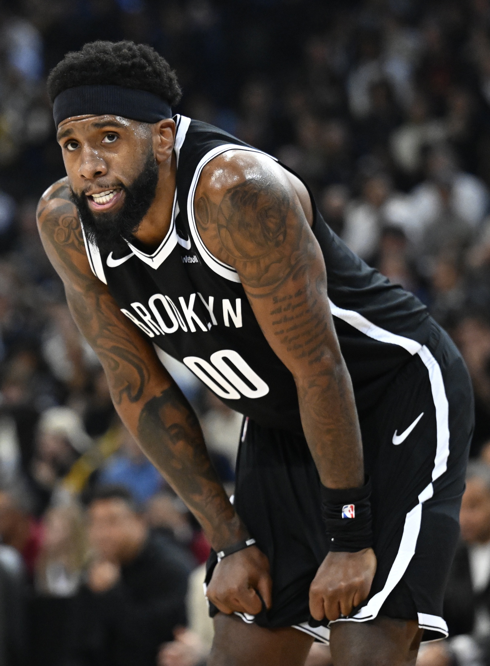 Brooklyn Nets forward Royce O'Neale (00) reacts against the Cleveland Cavaliers in the NBA Paris Game at AccorHotels Arena.