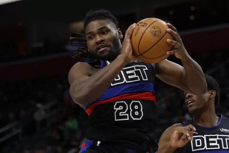 Jan 17, 2024; Detroit, Michigan, USA; Detroit Pistons center Isaiah Stewart (28) grabs the rebound in the first half against the Minnesota Timberwolves at Little Caesars Arena. Mandatory Credit: Rick Osentoski-USA TODAY Sports