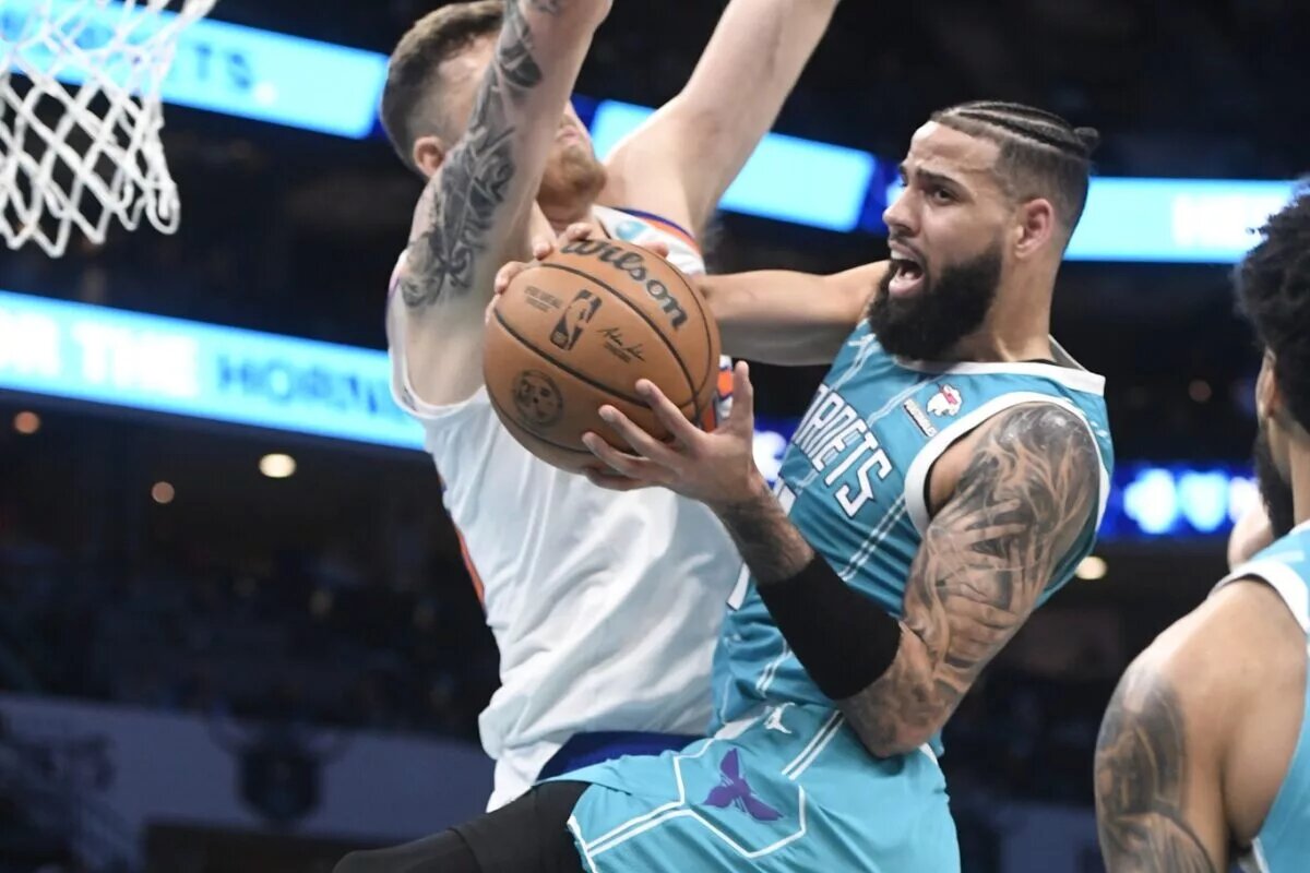 Charlotte Hornets forward Cody Martin (11) moves in during the second half against the New York Knicks at the Spectrum Center.