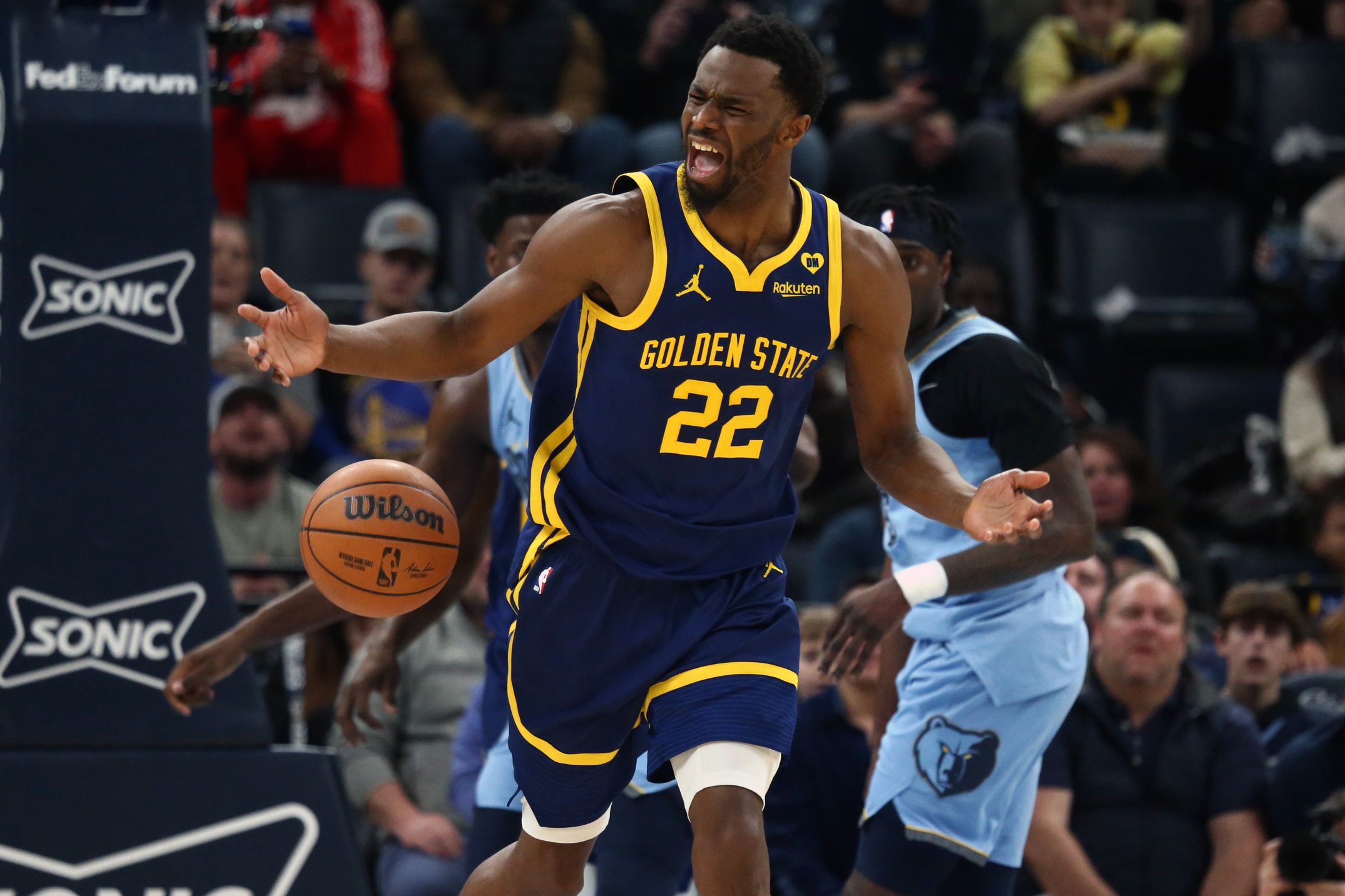 Feb 2, 2024; Memphis, Tennessee, USA; Golden State Warriors forward Andrew Wiggins (22) reacts during the first half against the Memphis Grizzlies at FedExForum. Mandatory Credit: Petre Thomas-USA TODAY Sports