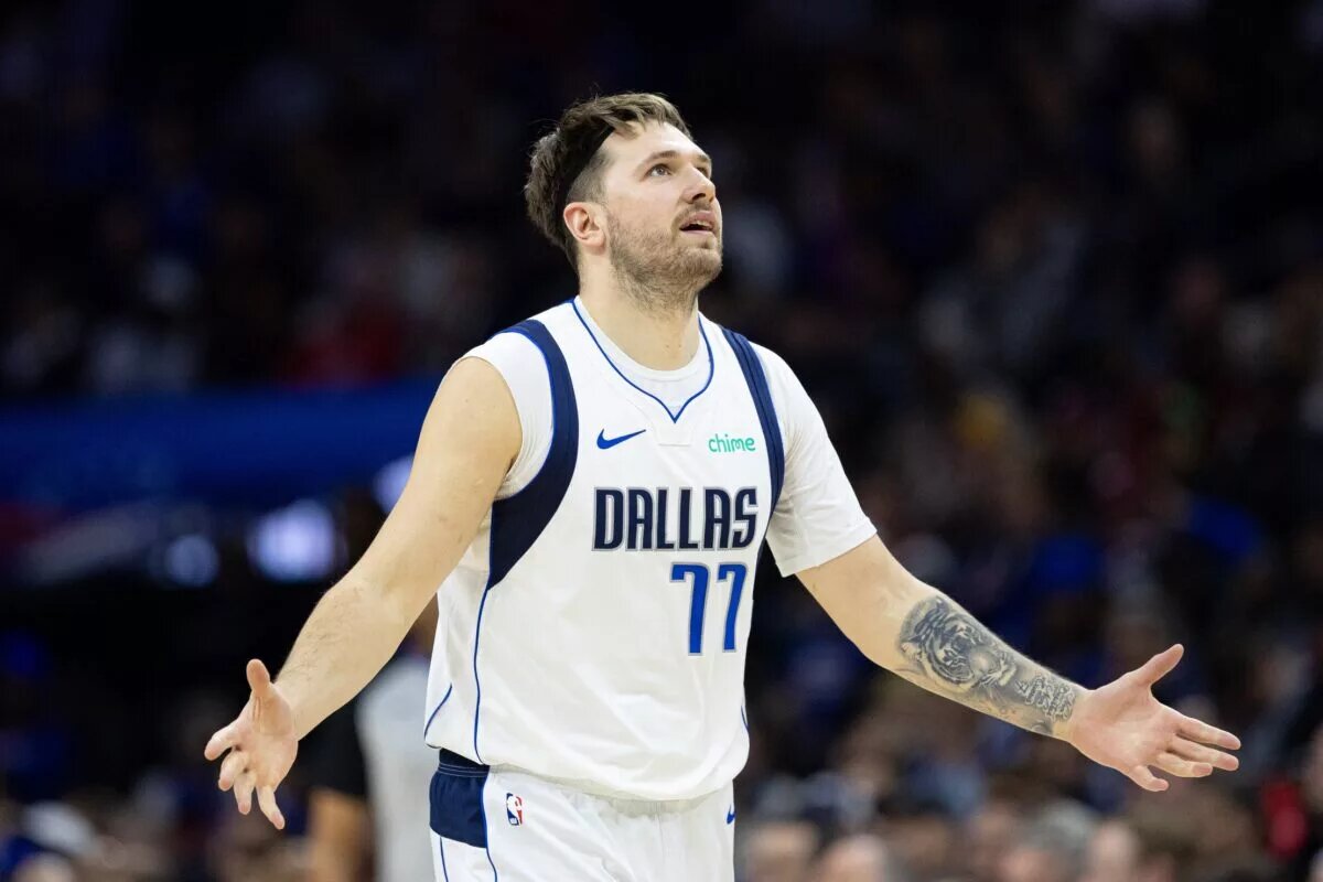 Feb 5, 2024; Philadelphia, Pennsylvania, USA; Dallas Mavericks guard Luka Doncic (77) reacts after scoring against the Philadelphia 76ers during the fourth quarter at Wells Fargo Center. Mandatory Credit: Bill Streicher-USA TODAY Sports