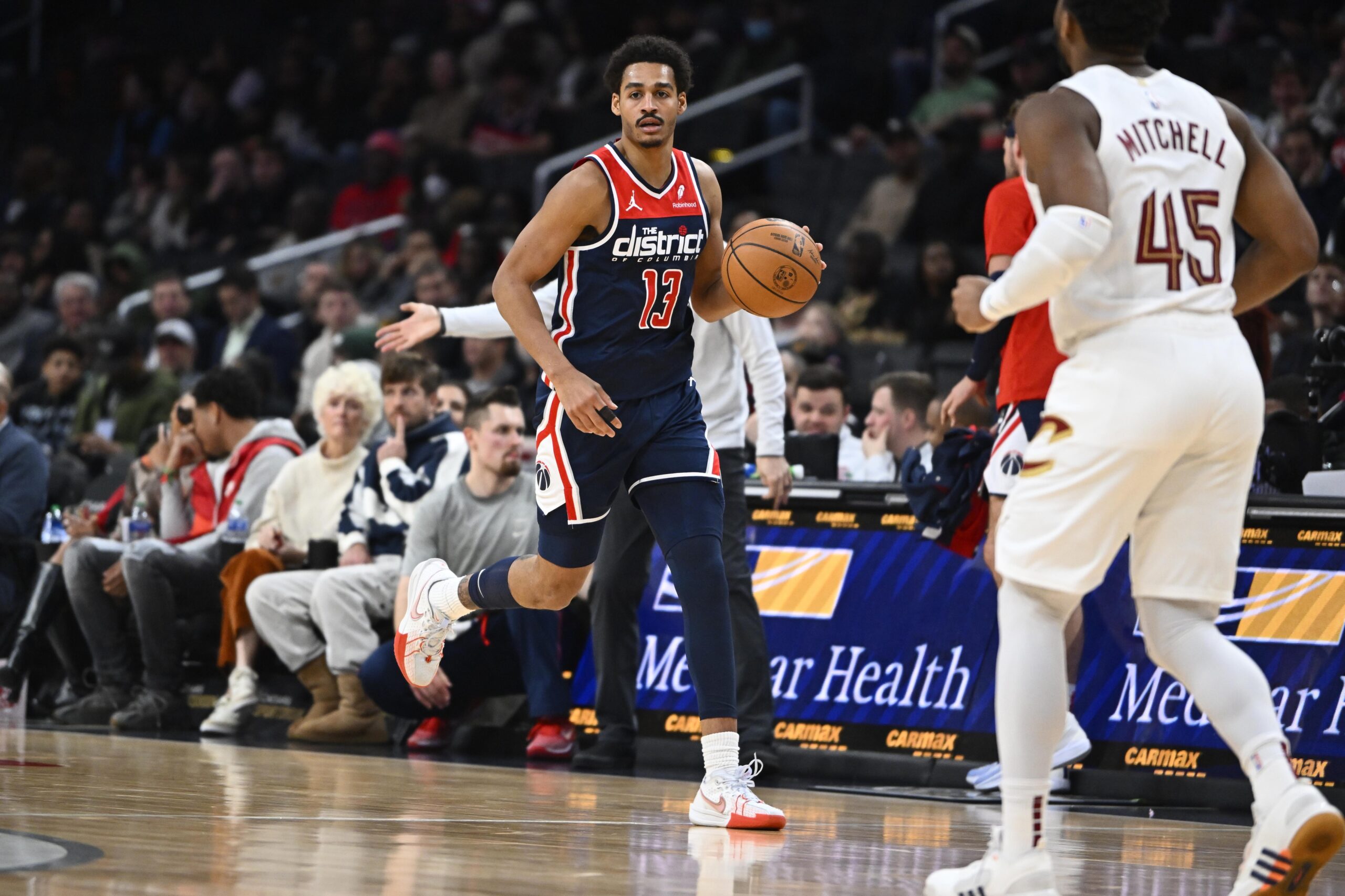 Feb 7, 2024; Washington, District of Columbia, USA; Washington Wizards guard Jordan Poole (13) dribbles against the Cleveland Cavaliers during the second half at Capital One Arena. Mandatory Credit: Brad Mills-USA TODAY Sports