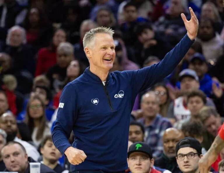 Golden State Warriors head coach Steve Kerr reacts after a score against the Philadelphia 76ers during the third quarter at Wells Fargo Center.