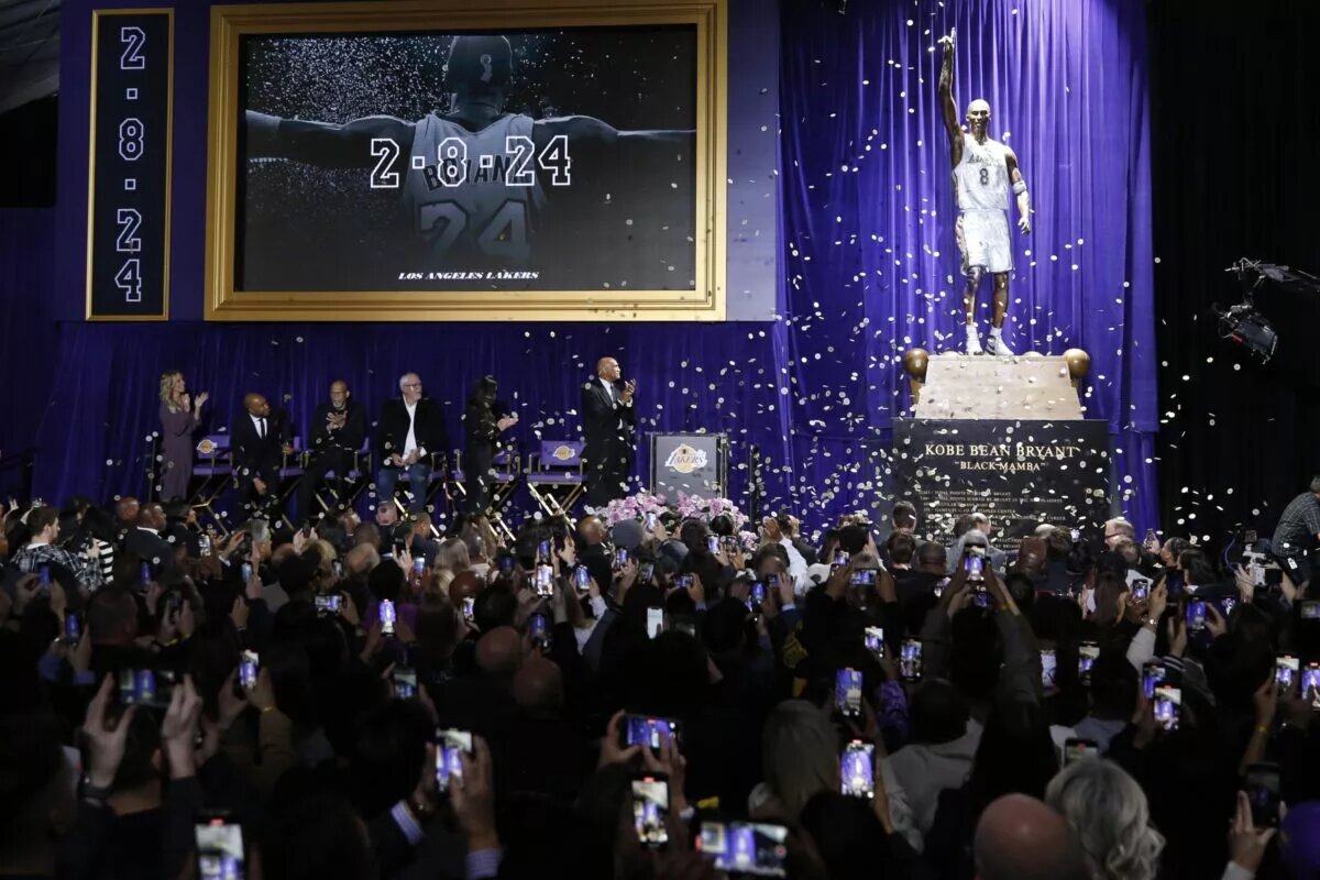 A statue for former Los Angeles Lakers guard Kobe Bryant is unveiled during a ceremony at Star Plaza outside of Crypto.com Arena