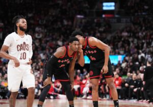 Toronto Raptors forward Scottie Barnes (4) talks with guard RJ Barrett (9) against the Cleveland Cavaliers during the fourth quarter at Scotiabank Arena.